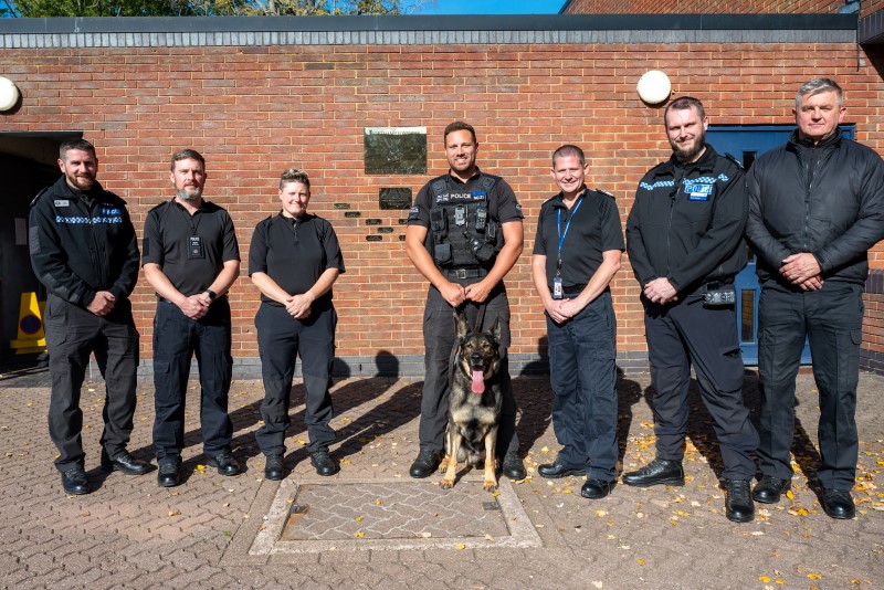 Chief Constable Ivan Balhatchet (third from right) joined officers from the Dog Section and RPD Rocky for the unveiling of the roll of honour